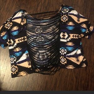 A tribal print crop top shirt